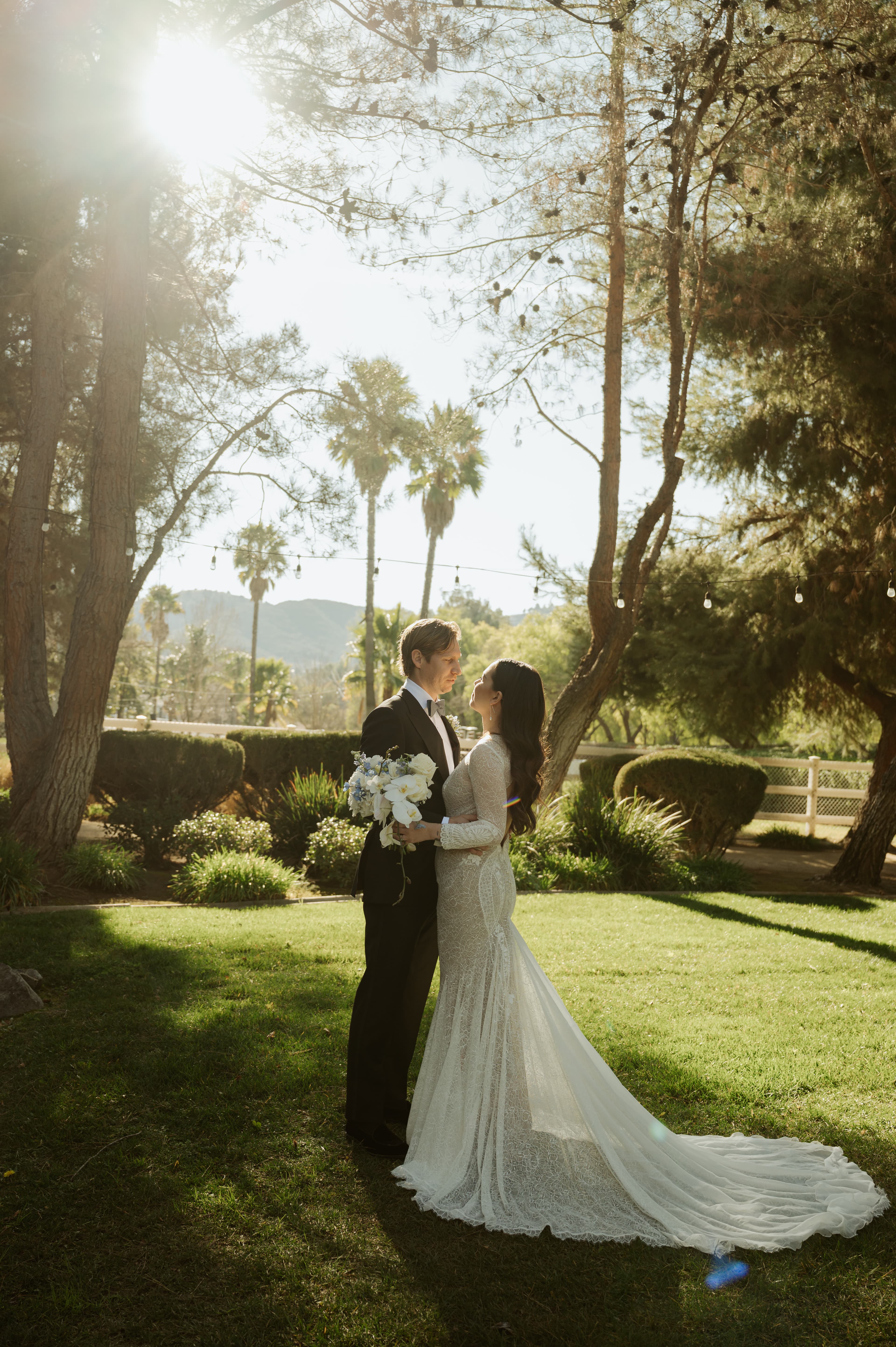 Bride and groom on the lawn at Hawk Ranch
