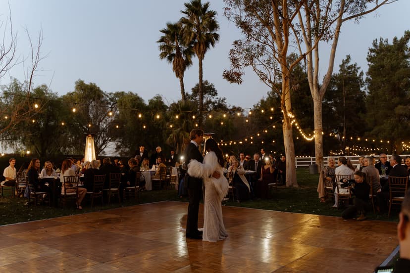 Golden hour over the Hawk Ranch ceremony lawn